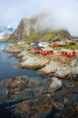 Hamnoy fishing village with red houses in Norwegian fjord. Lofoten Islands, Norway