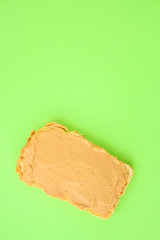 peanut butter sandwich (tasty snack, bread toast buttered with nut butter) menu concept. food background. copy space. Top viev
