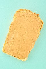 peanut butter sandwich (tasty snack, bread toast buttered with nut butter) menu concept. food background. copy space. Top viev