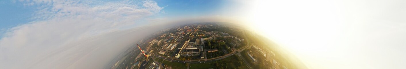 Aerial drone 180 degree panoramic view on polluted with smog city during sunrise