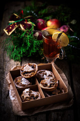Christmas Mince pies on a Christmas rustic background