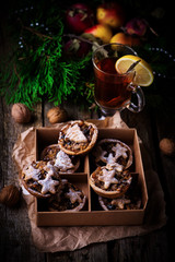 Christmas Mince pies on a Christmas rustic background
