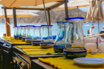 Water jugs lined up at a restaurant