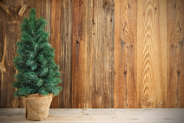 Christmas Tree With Wooden Background Or Texture. Copy Space For Your Free Text