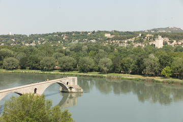 The Saint Bénézet bridge, known as the Avignon bridge, facing the city of Villeneuve les vignon....
