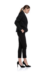 businesswoman waiting in line and looking down disappointed