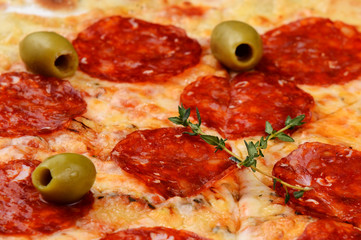 pizza with tomatoes and olives