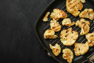 cauliflower grilled (fried grill vegetables or snack salad, bruschetta with tomato) menu concept. food background. copy space. Top view