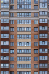 Fototapeta na wymiar Facade of a modern multistory residential building
