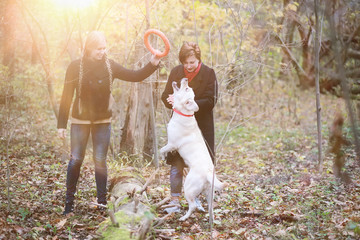 Fototapeta premium Young girl on a walk in the autumn