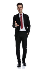 Cheerful businessman giving a handshake