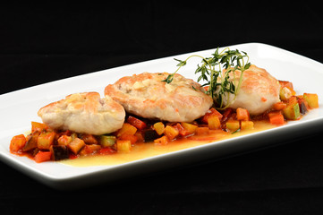 grilled chicken with vegetables on white plate
