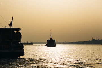 silhouette of steamboat at Istanbul Bosporus, the view from Kadikoy, Asian side of Istanbul