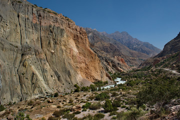 Tajikistan. The Pamir highway. Panorama of the mountain river Iskanderdarya flowing from lake Iskanderkul.
