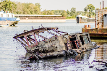 Novi Sad, Serbia - September 29. 2019: The wreck of the tanker at the Danube River in Novi Sad