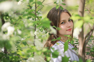 A girl in a spring green park