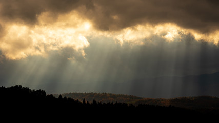 Dark clouds and sun rays