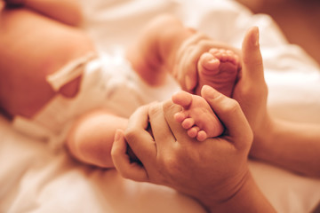 hands of mother and baby  