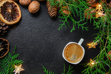 coffee, New Year, Christmas background or Noel holiday festive (nuts, specials, decorations and gifts on the table, greeting card) menu concept. food background. copy space. Top view