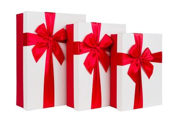 white boxes with red bows isolated on white background
