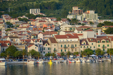 Fototapeta premium View of Makarska city center from the sea in Makarska, Dalmatia, Croatia on June 11, 2019. 