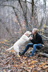 Fototapeta premium Young girl on a walk in the autumn