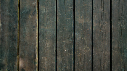 texture of the wooden promenade in a warm autumn day