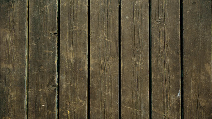 texture of the wooden promenade in a warm autumn day