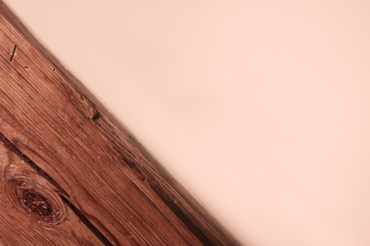 wood and the pink wall