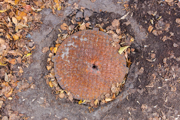 Fototapeta premium old rusty sewer manhole, texture