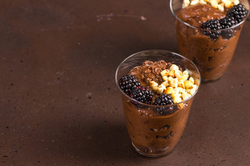 Dark chocolate mousse with blackberries and roasted hazelnuts