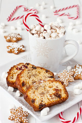 Christmas hot chocolate,  gingerbread cookies and  stollen   on light background