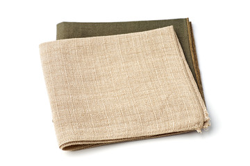 Green and beige textile napkins on white