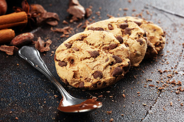 Chocolate cookies on wooden table. Chocolate chip cookies shot on table