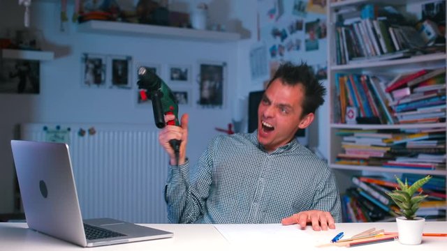 crazy guy shoots from a puncher, as from a machine gun