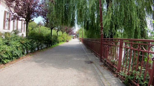 king Umberto street along the Dora Baltea river in Ivrea city, Torino, region Piemonte, Italy