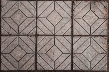 Texture of paving tiles with different geometric shapes