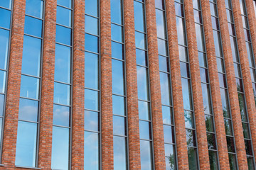 A modern brick building that houses many companies