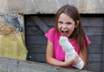  Frightened child hiding in the basement