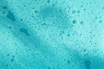 Soap bubbles background- suds liquid