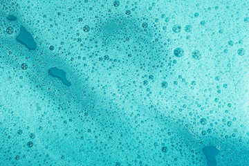 Soap bubbles background- suds liquid