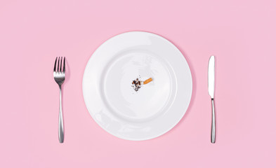 Unhealthy Habbit. Plate with cigarette butt isolated on pink top view