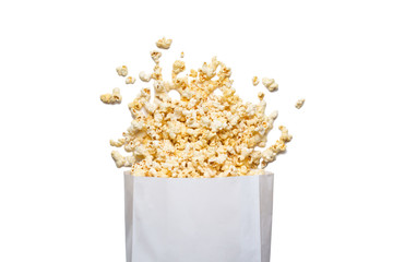 Fresh tasty salty popcorn with a box isolated on white background