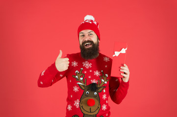 best winter holidays. looking good in this sweater. merry christmas. got xmas gift. seasonal discounts. present from santa. happy new year. cheerful bearded man after shopping. best prices here