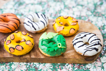 Colorful delicious cute animals donuts. animal donut. Animal print