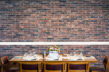 Lunch table with brick wall background 