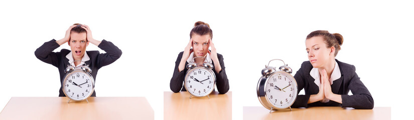 Businesswoman with clock missing her deadlines