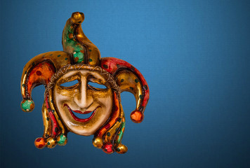 Traditional Venetian masks on the streets of Venice, Italy, isolated on colorful background. 