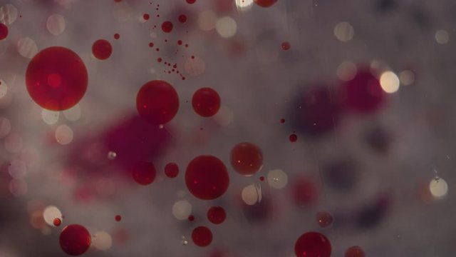 Macro abstract red bubble cells bokeh motion liquid texture background