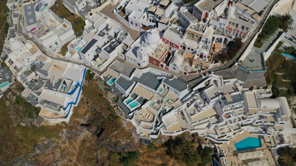 Naklejka premium Aerial drone photo of Fira main village of Santorini island with breathtaking views to Caldera and Aegean sea, Cyclades, Greece